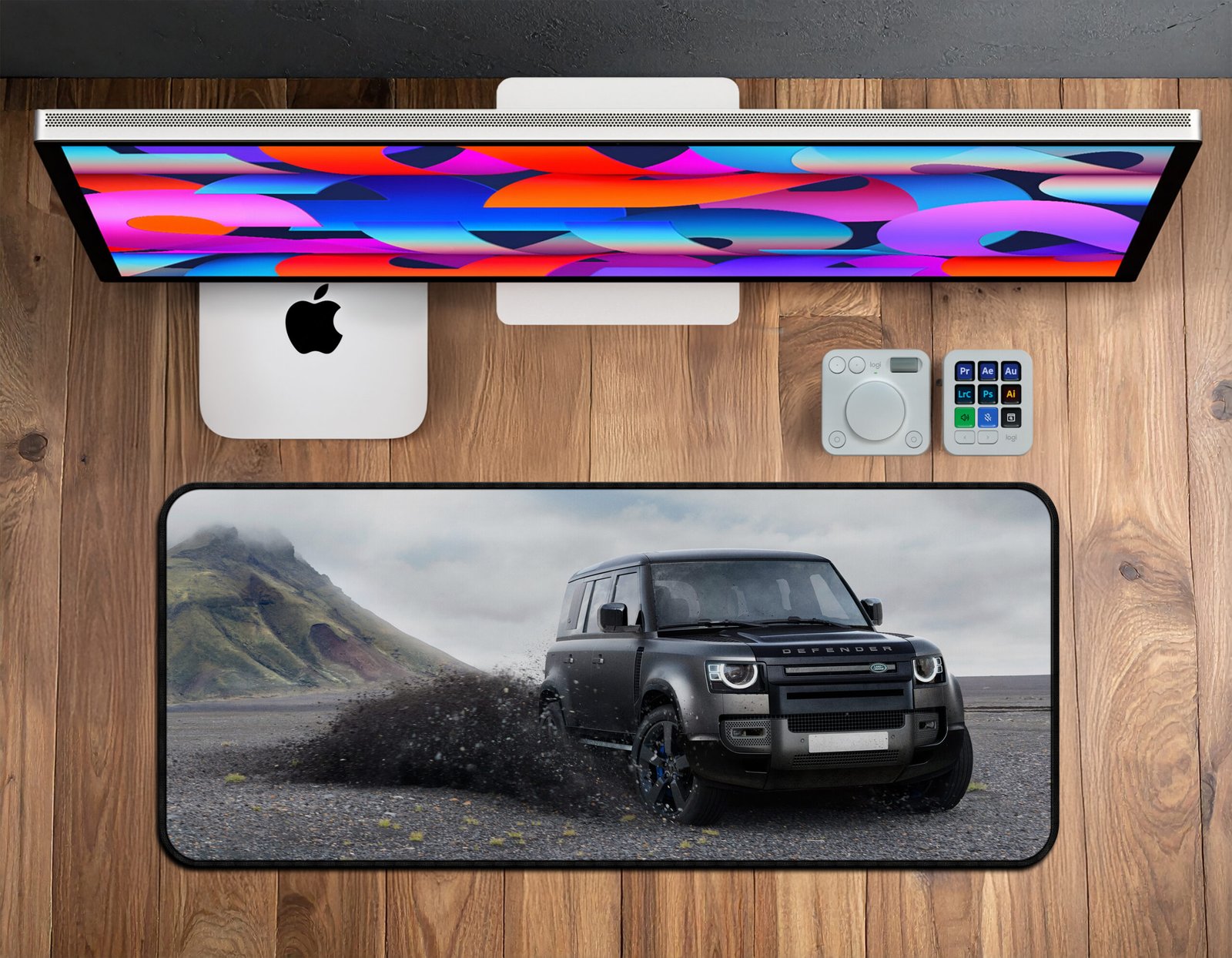 Defender Mud Splash Desk Mat | Premium Off-Road Workspace Pad Defender SUV splashing through mud printed on premium desk mat.